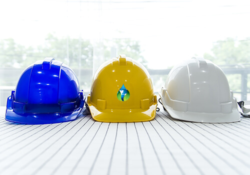 three hard hats